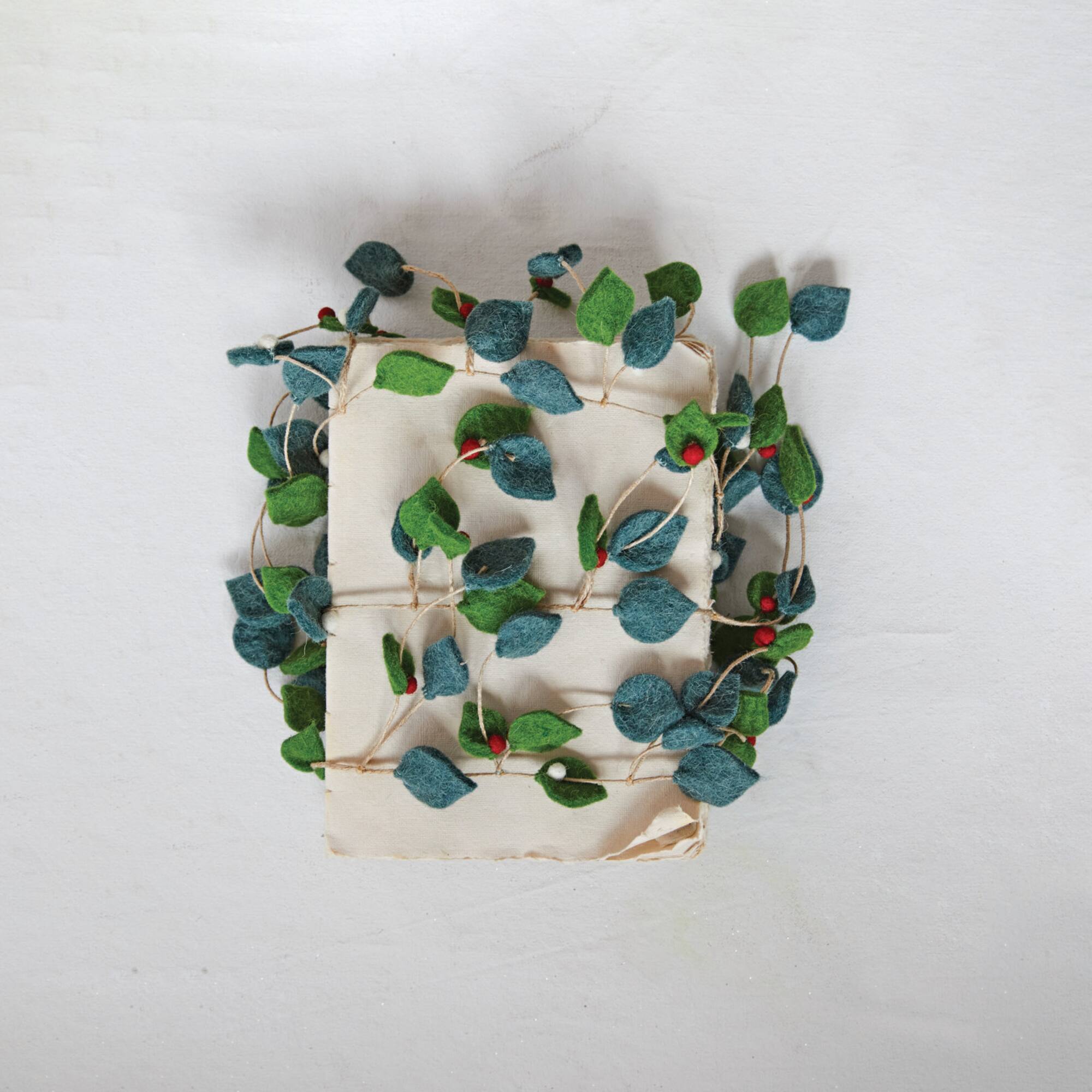 Hello Honey® 6ft. Green Leaves & Berries Handmade Felt Garland